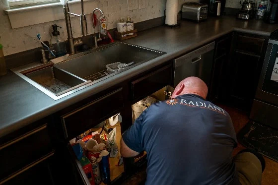 Radiant Tech Fixing Kitchen Sink