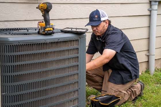 Radiant Tech Working on Air Conditioner