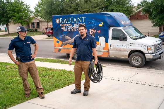 Two Radiant Techs with Hose
