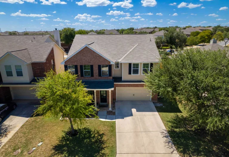 An aerial view of a home in a suburb