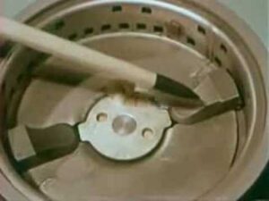 A detailed, up close image of a garbage disposal