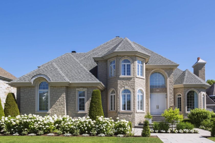 A luxury home facade typical of those in New Braunfels, TX