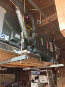 New gas furnace installed in attic during San Antonio HVAC system replacement