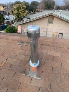 New HVAC vent pipe installed through the roof for proper system ventilation