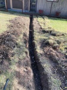 Trench dug for new underground water line during repipe in Dripping Springs