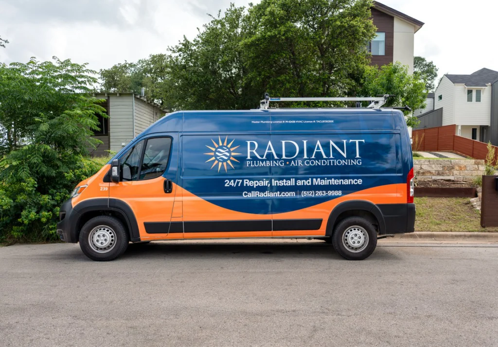 Radiant service van parked on a residential Austin street during fall tune-up season