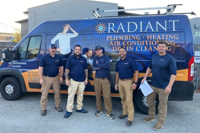 Part of the Radiant HVAC team in front of the Radiant Truck