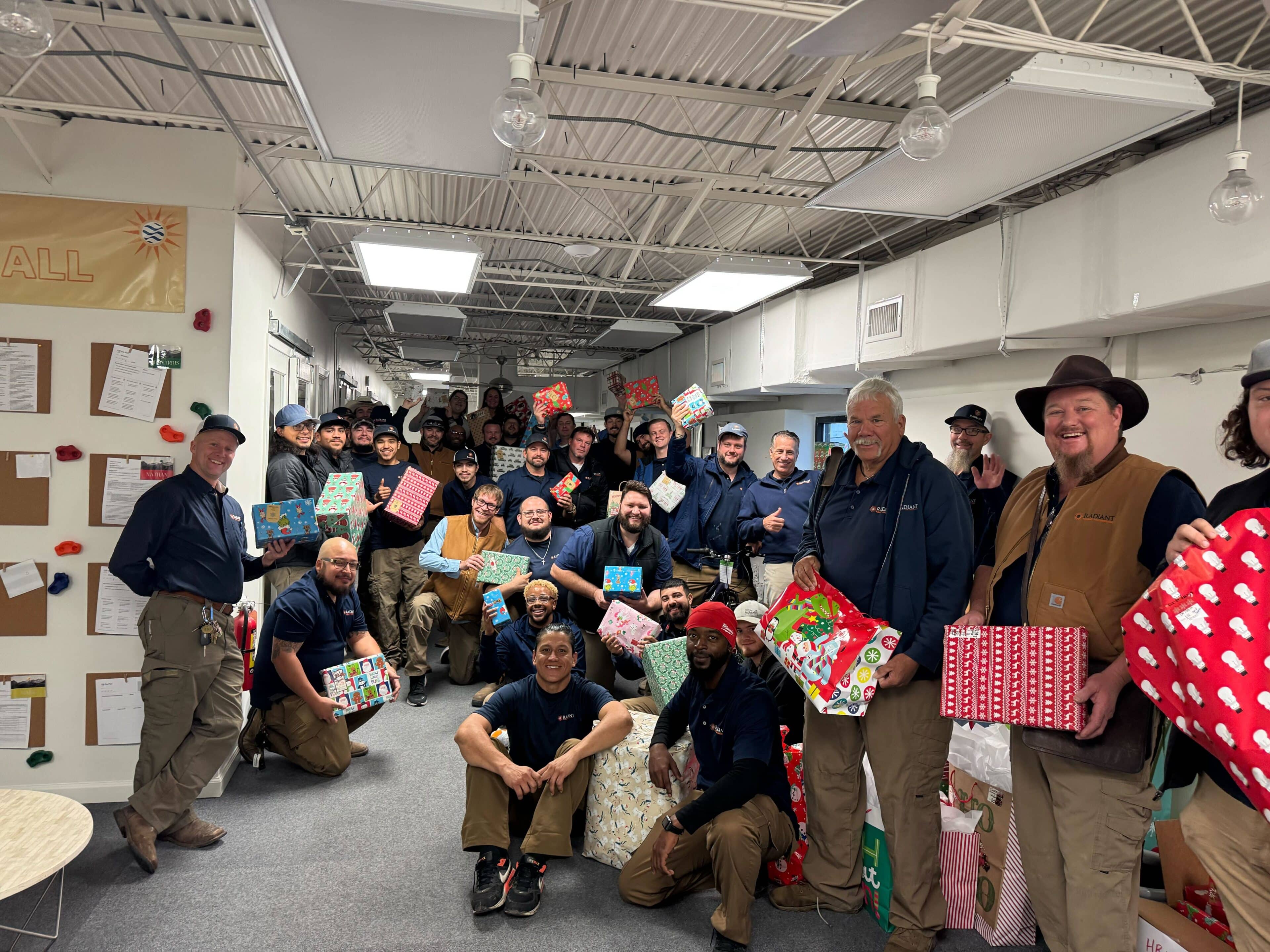 The Radiant Team with their toys for Any Baby Can in 2024