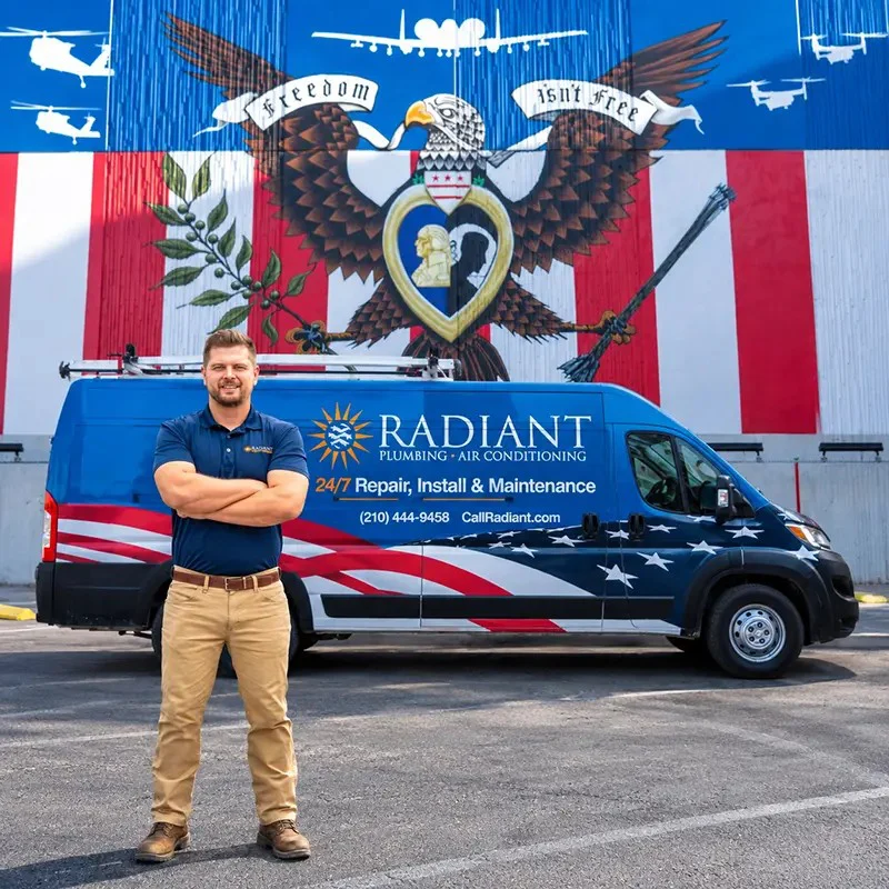 Radiant technician walking from a Radiant truck to a San Antonio home for a furnace repair