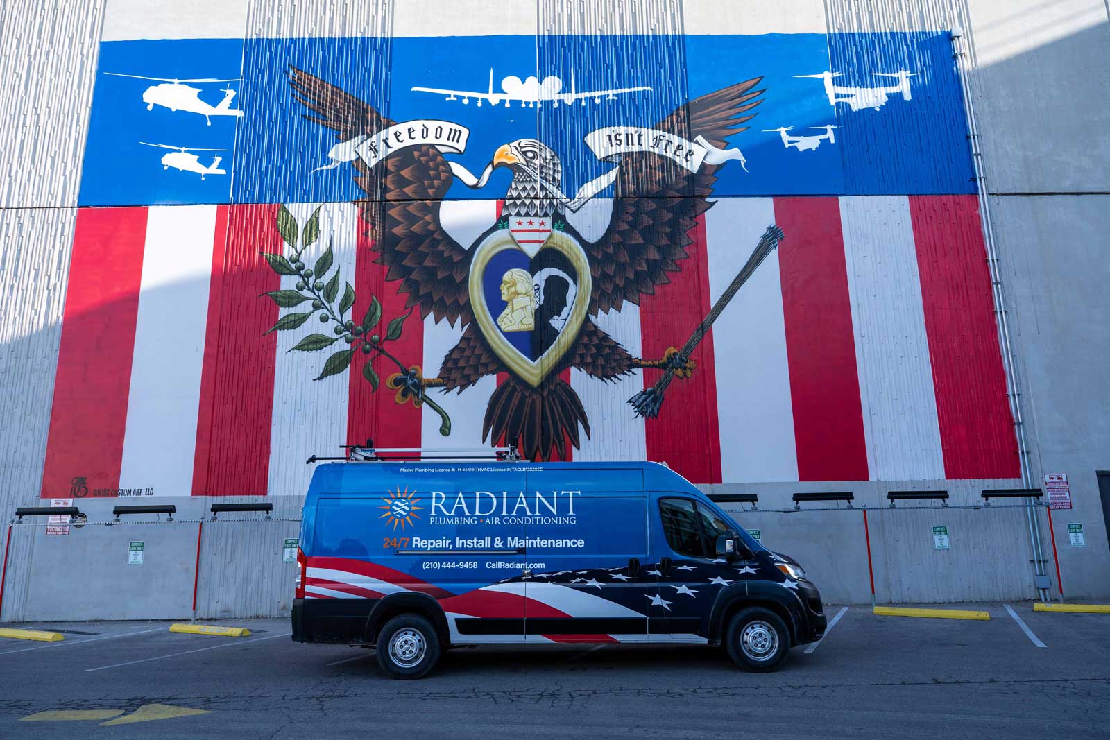 The Radiant Plumbing & Air Conditioning truck parked at the Veteran Affairs mural in San Antonio