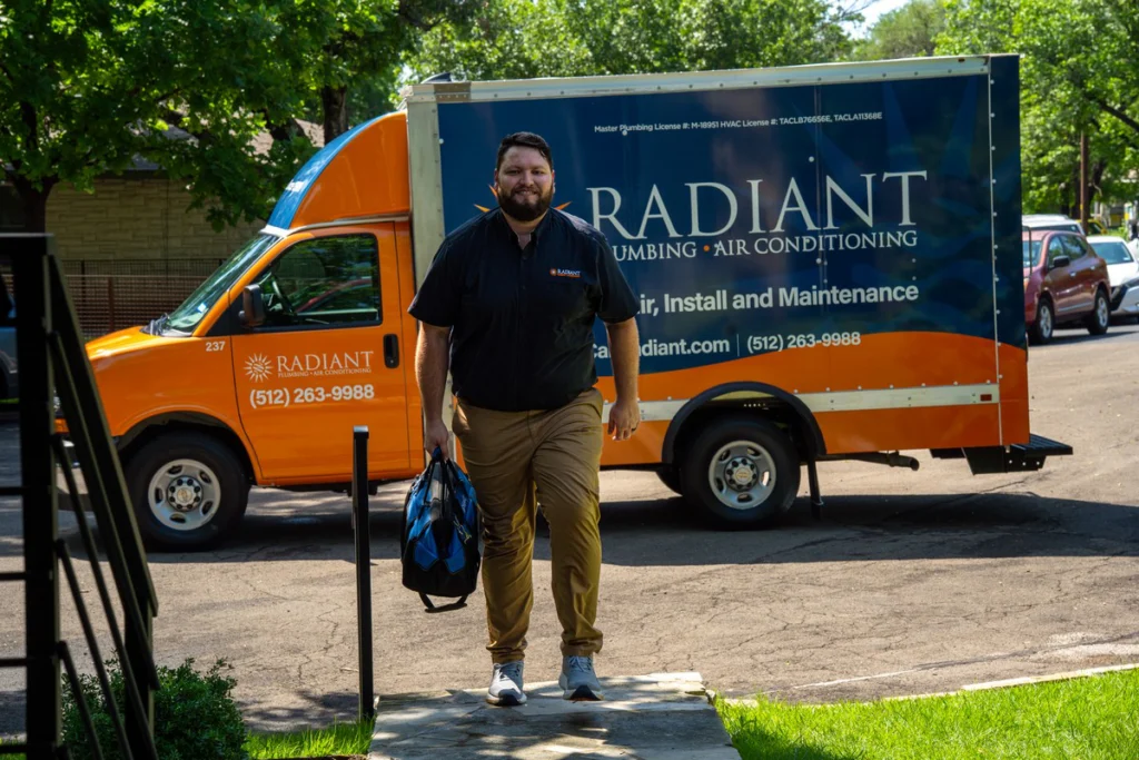 Radiant plumber arriving at a home to replace a water heater