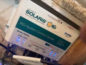 Solaris indoor air quality control panel installed near HVAC system
