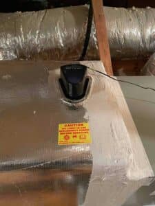 UV air purification system mounted on the supply plenum to improve indoor air quality.